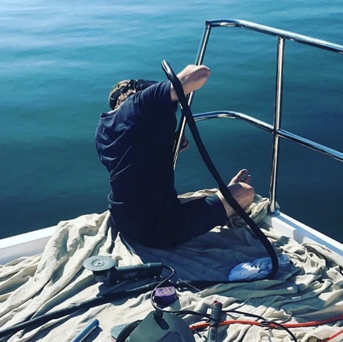 Matt welding a rail on the bow of a super yacht